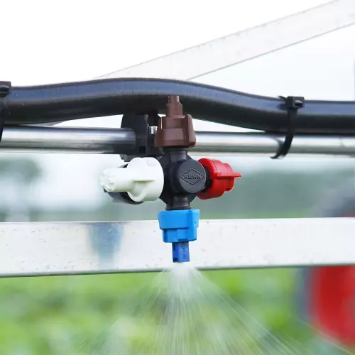 Fotografía de un quadrijet (cuatro chorros) KUHN en acción