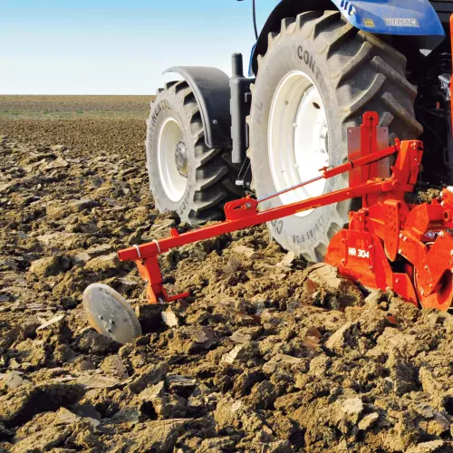 Marcadores laterales fijados en la grada rotativa de la sembradora mecánica integrada COMBILINER INTEGRA